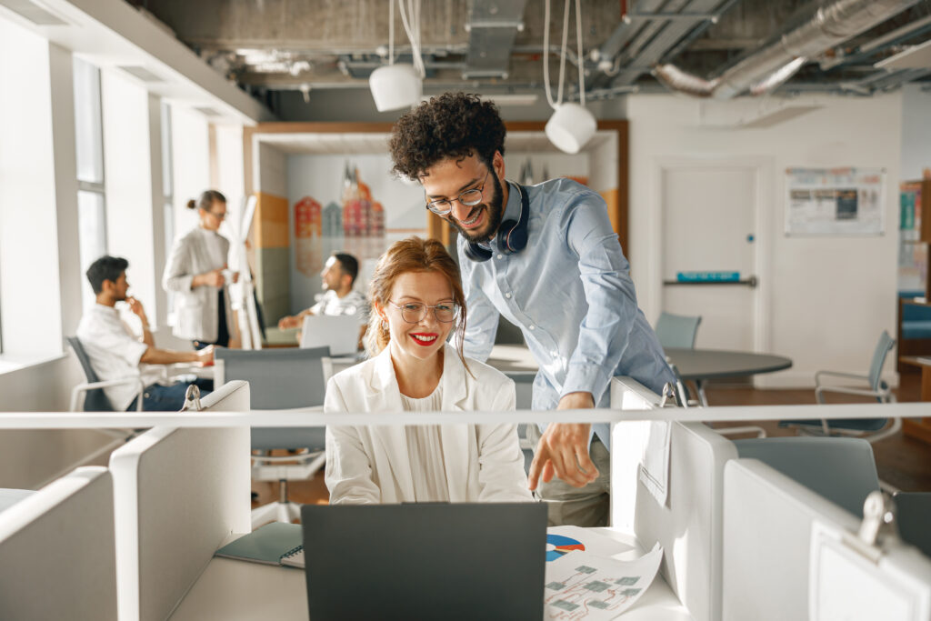 Business people working together in a bright office